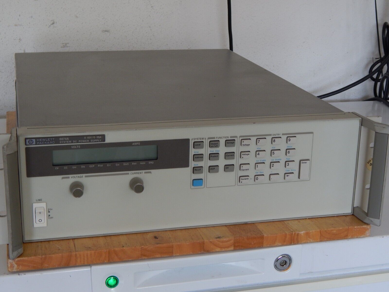 HP 6674A DC Power Supply 0 to 80V, 0- 26A, 2000W GPIB  opt. J05